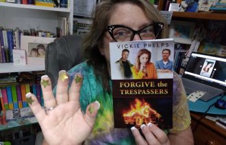 Christy holding "Forgive the Trespassers"